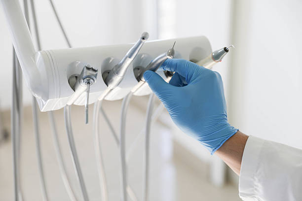 Professional Tooth Extraction technician working in Burlington, WI